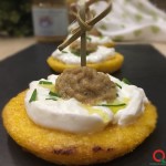 Crostini di polenta con burrata e patè di tinca affumicata